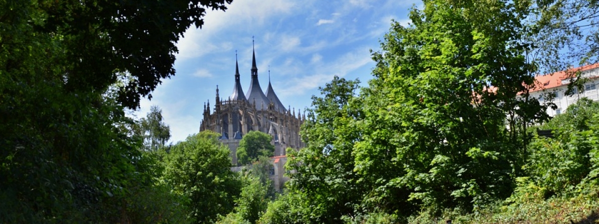 a cathedral and railroad tracks